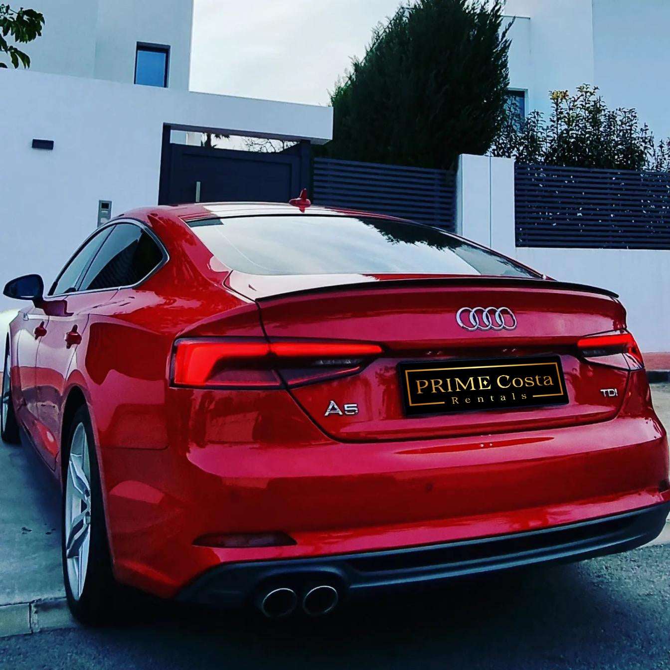 Red Audi A5 TDI S-Line for rent in Marbella – 2.0L diesel, automatic, stylish 5-seat limousine.