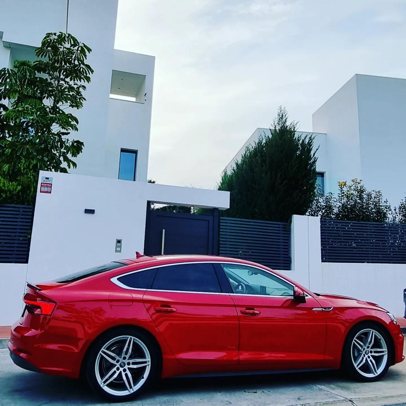 Red Audi A5 TDI S-Line for rent in Marbella – 2.0L diesel, automatic, stylish 5-seat limousine.