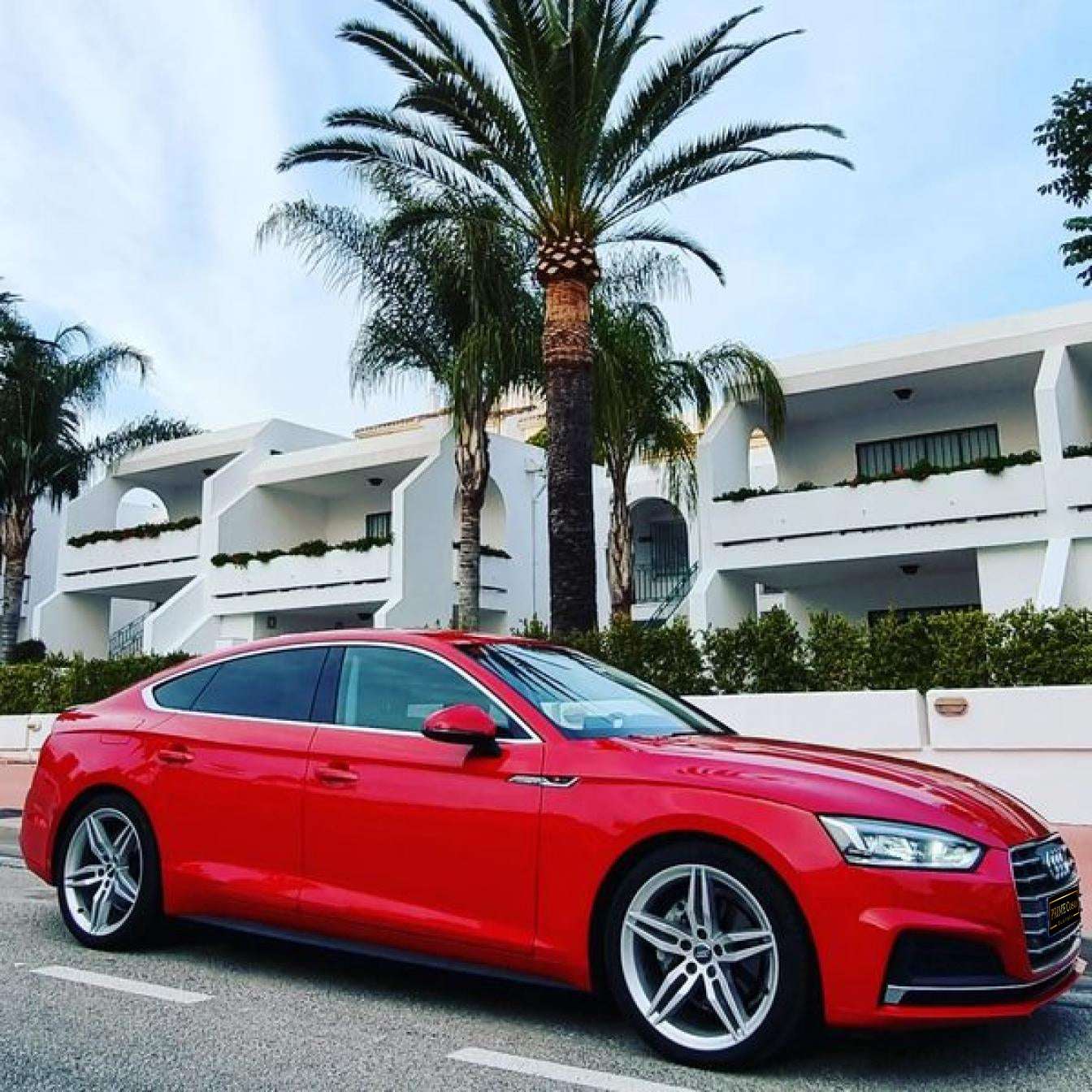 Red Audi A5 TDI S-Line for rent in Marbella – 2.0L diesel, automatic, stylish 5-seat limousine.