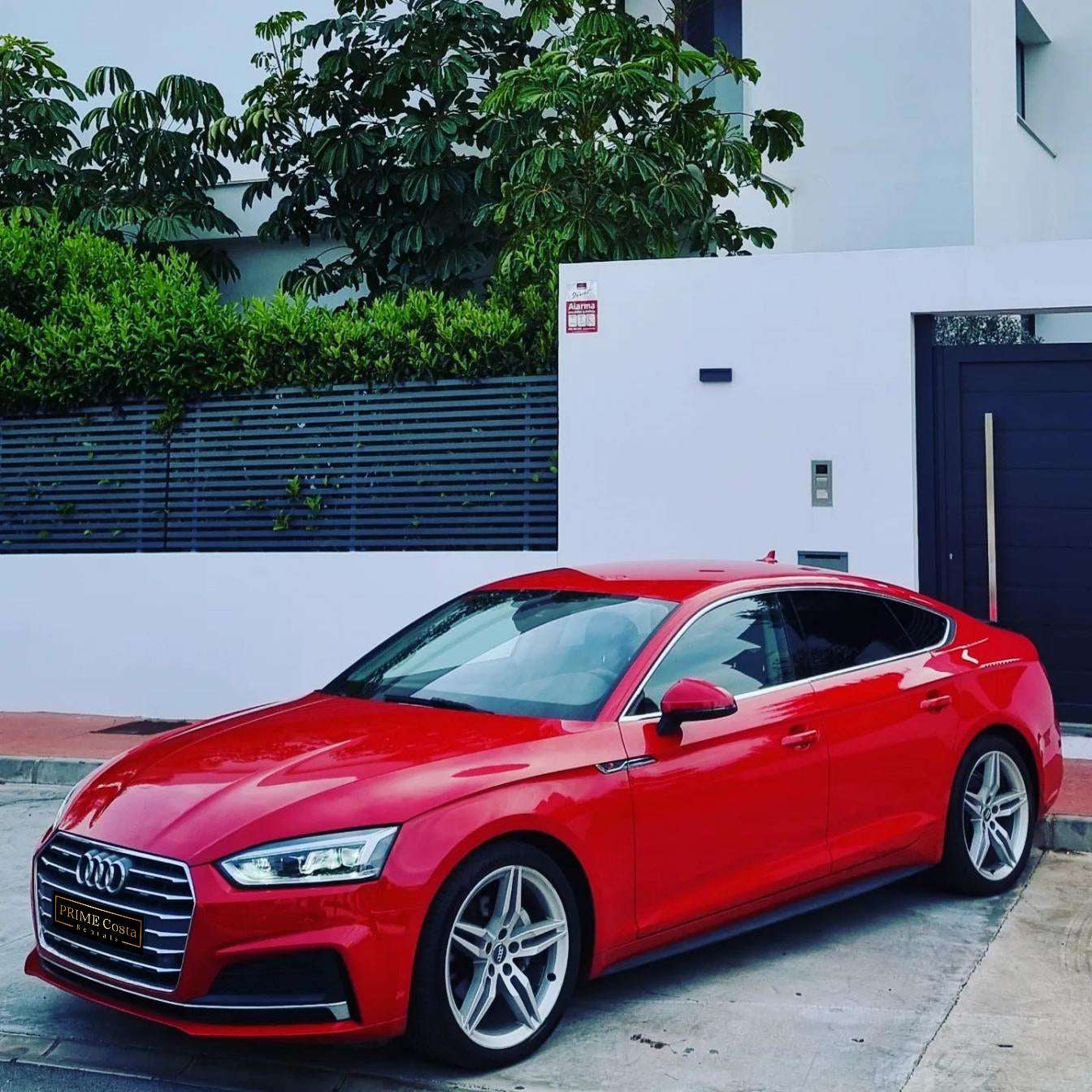Red Audi A5 TDI S-Line for rent in Marbella – 2.0L diesel, automatic, stylish 5-seat limousine.