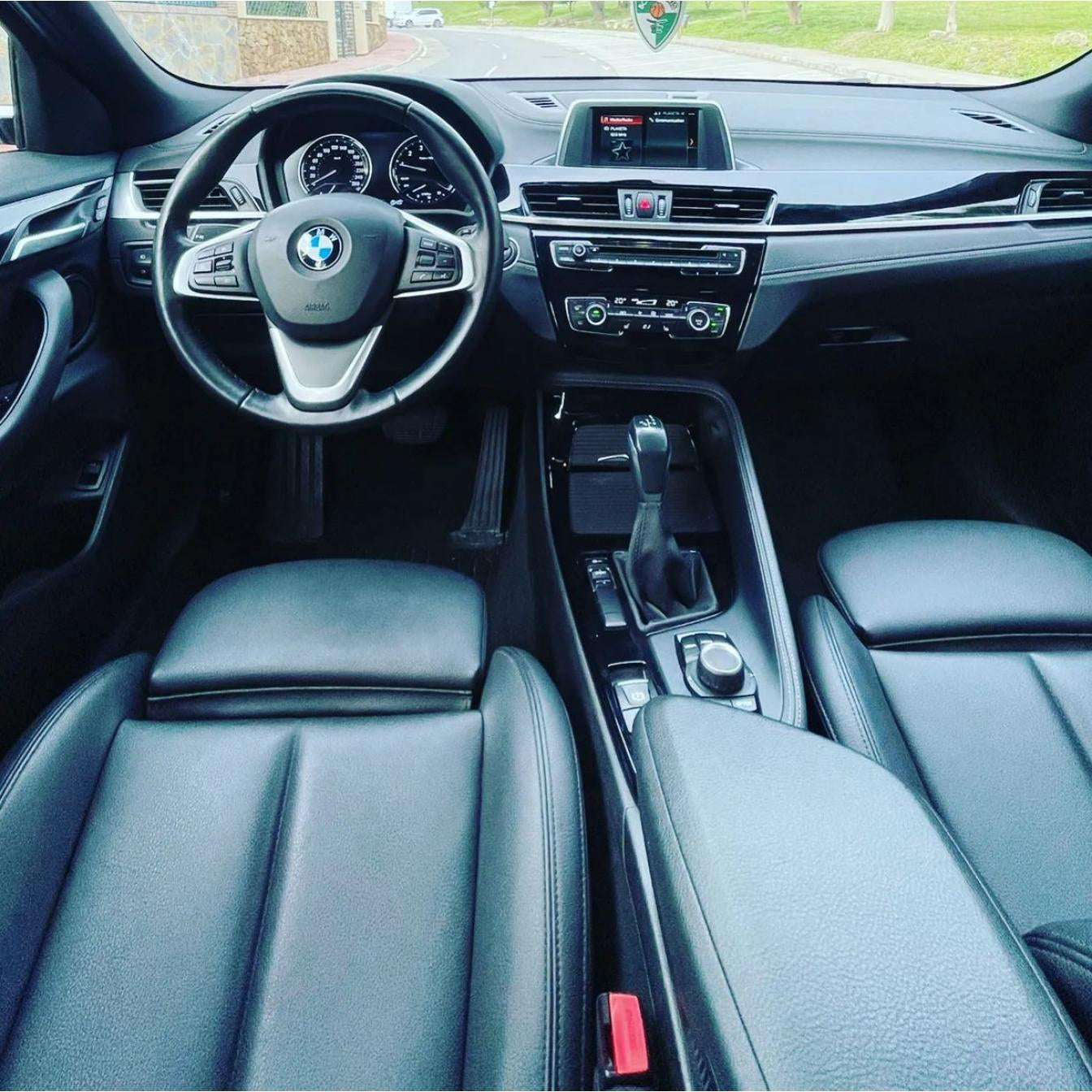 White BMW X2 SUV for rent in Marbella – automatic 4WD, 2.0L engine, compact 5-seater crossover.