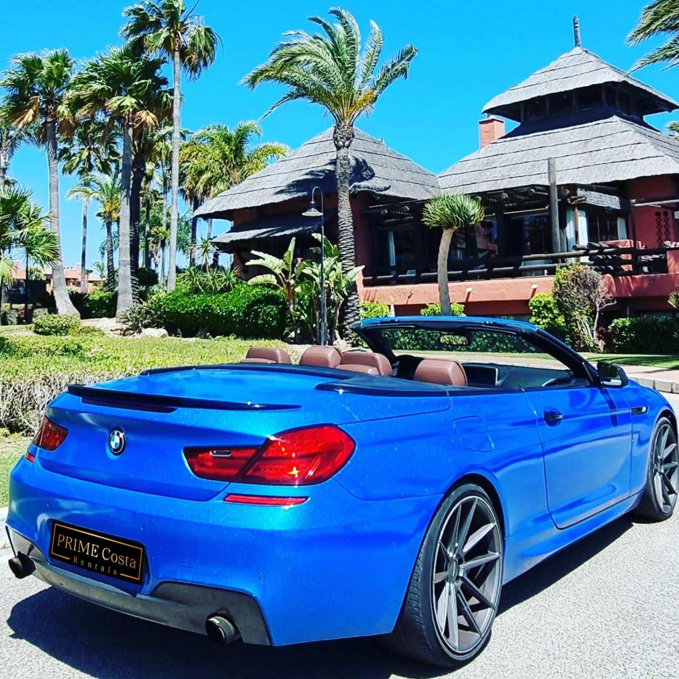 Blue BMW 640i Cabrio convertible for rent in Marbella – 3.0L automatic, 4 seats, luxury open-top driving.