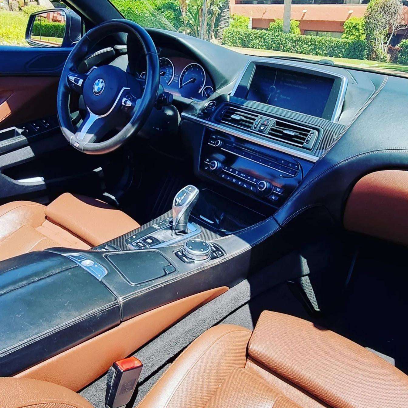 Blue BMW 640i Cabrio convertible for rent in Marbella – 3.0L automatic, 4 seats, luxury open-top driving.