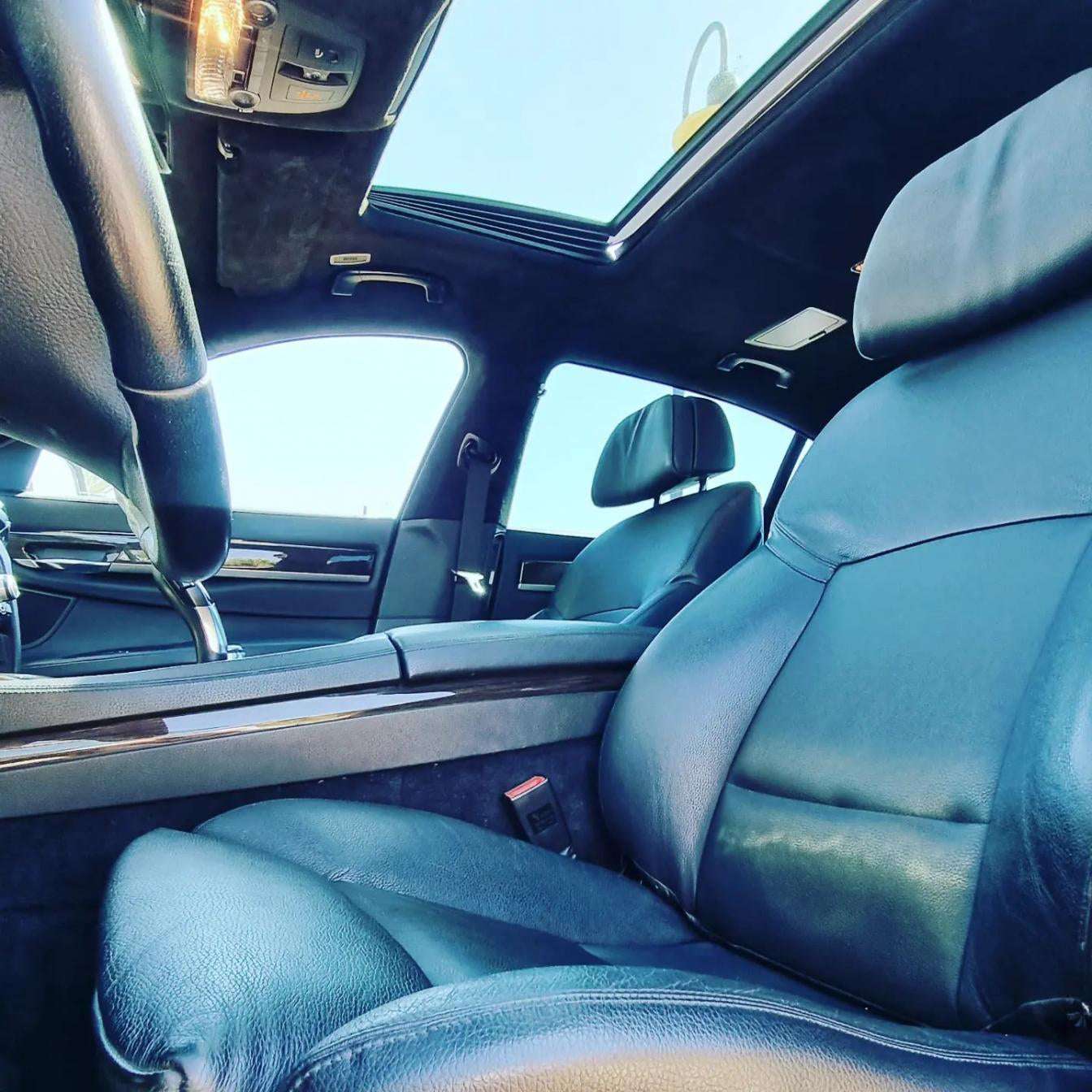 Black BMW 740Li limousine sedan for rent in Marbella – 3.0L automatic luxury car with seating for 5.