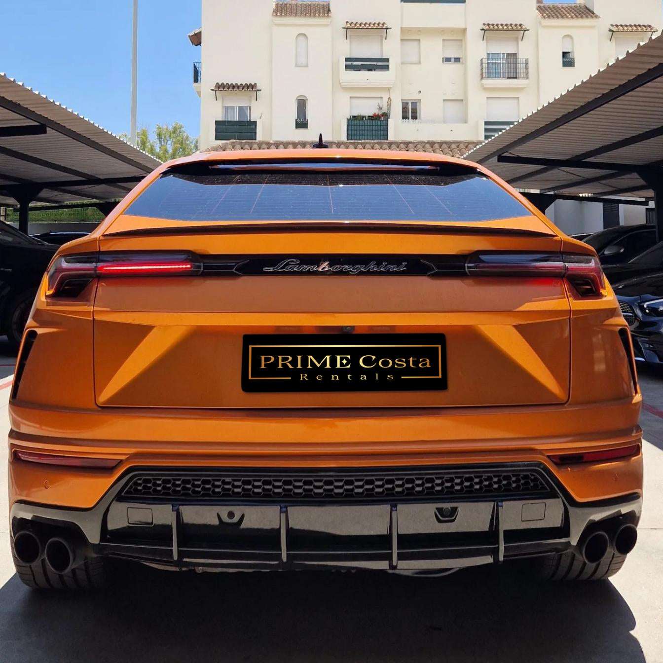 Orange Lamborghini Urus SUV for rent in Marbella – 641 HP, 4.0L V8, 4WD, automatic, 5 seats.