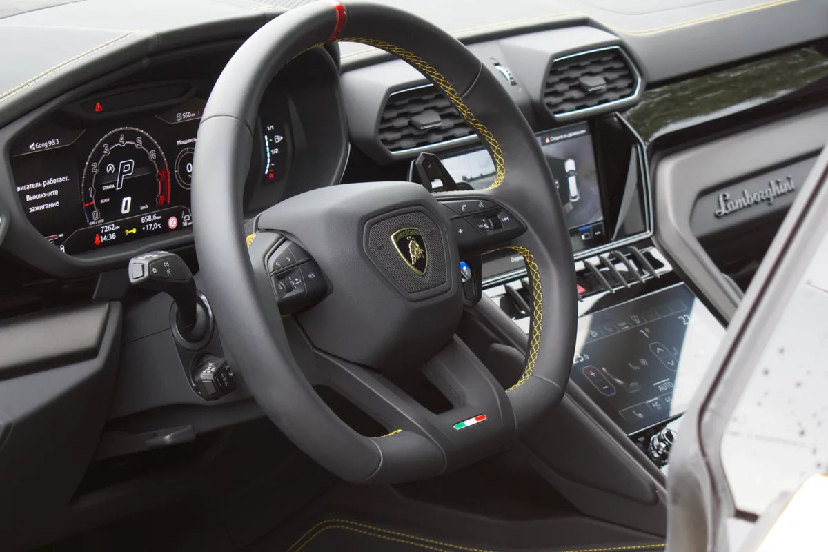 Yellow 2023 Lamborghini Urus S luxury SUV parked in Marbella, available for rent at Prime Costa Rentals.