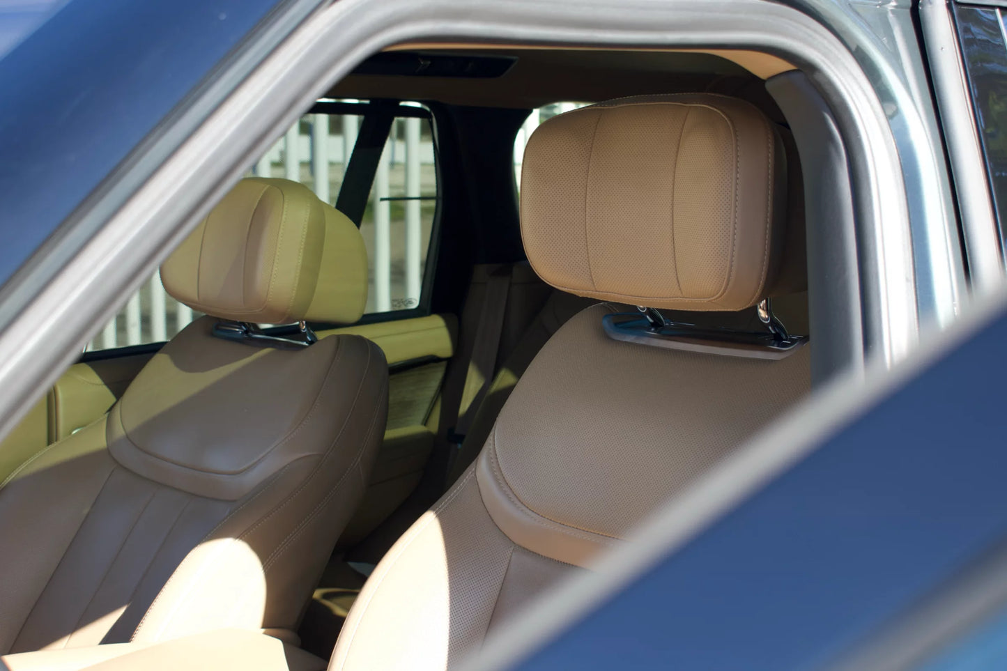 Green 2022 Range Rover Autobiography SUV parked in Marbella, available for rent from Prime Costa Rentals.