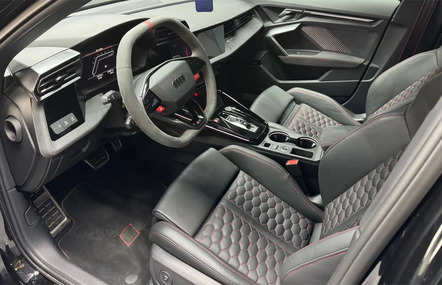 Audi RS3 2025 interior with sport bucket seats and automatic transmission – luxury performance rental