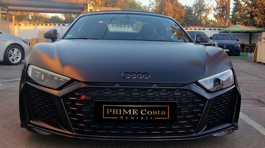 Audi R8 Cabriolet luxury convertible for rent in Alicante – V10 supercar, automatic transmission, open-top driving.