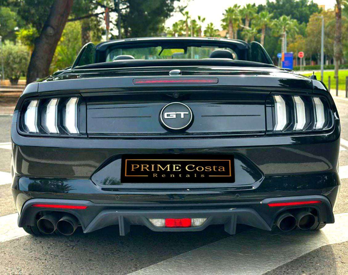 Ford Mustang GT 5.0 muscle car for rent in Alicante β V8 engine, automatic, iconic design.