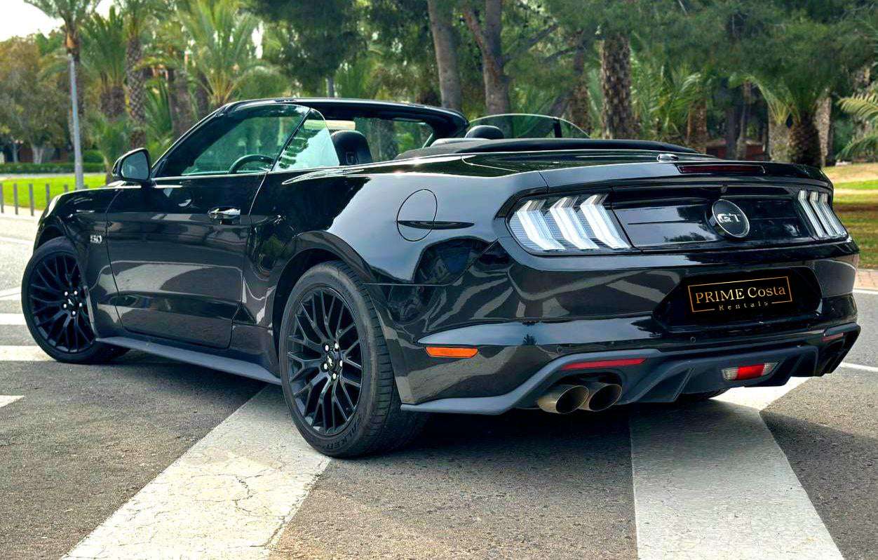 Ford Mustang GT 5.0 muscle car for rent in Alicante β V8 engine, automatic, iconic design.