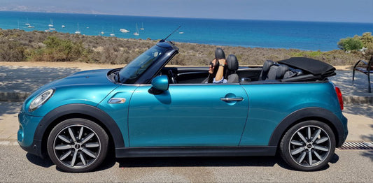 Mini Cooper Cabrio convertible for rent in Alicante – compact city car, stylish design, open-top driving.
