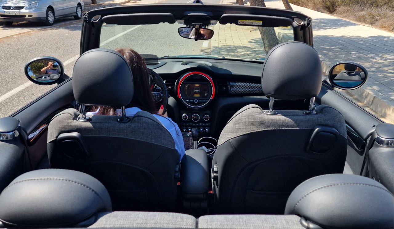 Mini Cooper Cabrio convertible for rent in Alicante β compact city car, stylish design, open-top driving.