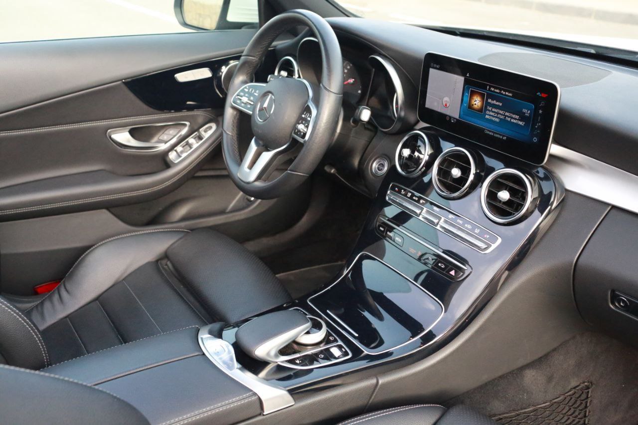 Mercedes-Benz C 200 Cabrio luxury convertible for rent in Alicante β stylish design, premium comfort, retractable roof.
