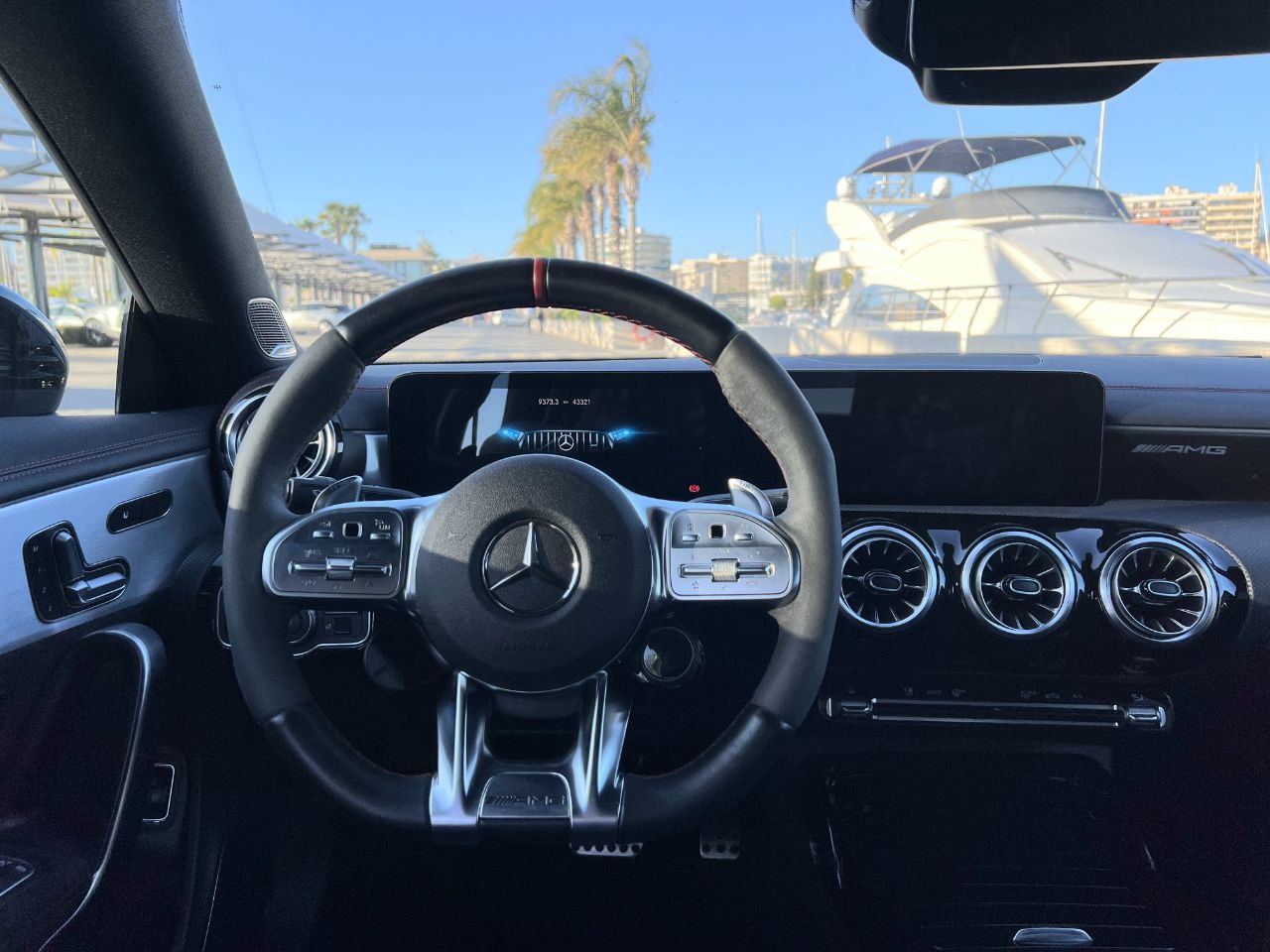 Mercedes-Benz CLA 45 AMG sports sedan for rent in Alicante β 381 HP turbocharged, luxury design, AWD.