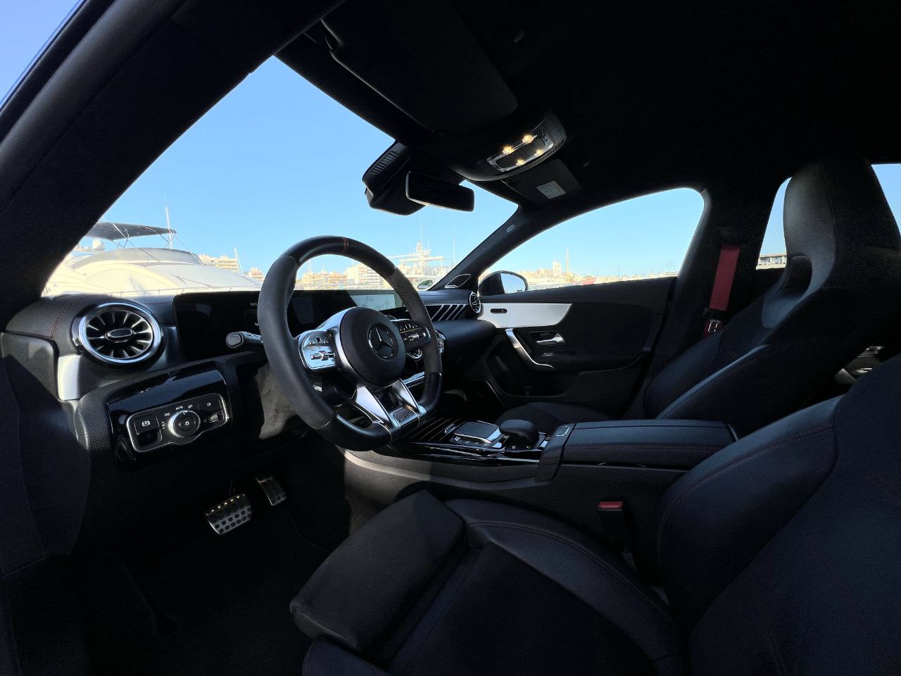 Mercedes-Benz CLA 45 AMG sports sedan for rent in Alicante β 381 HP turbocharged, luxury design, AWD.