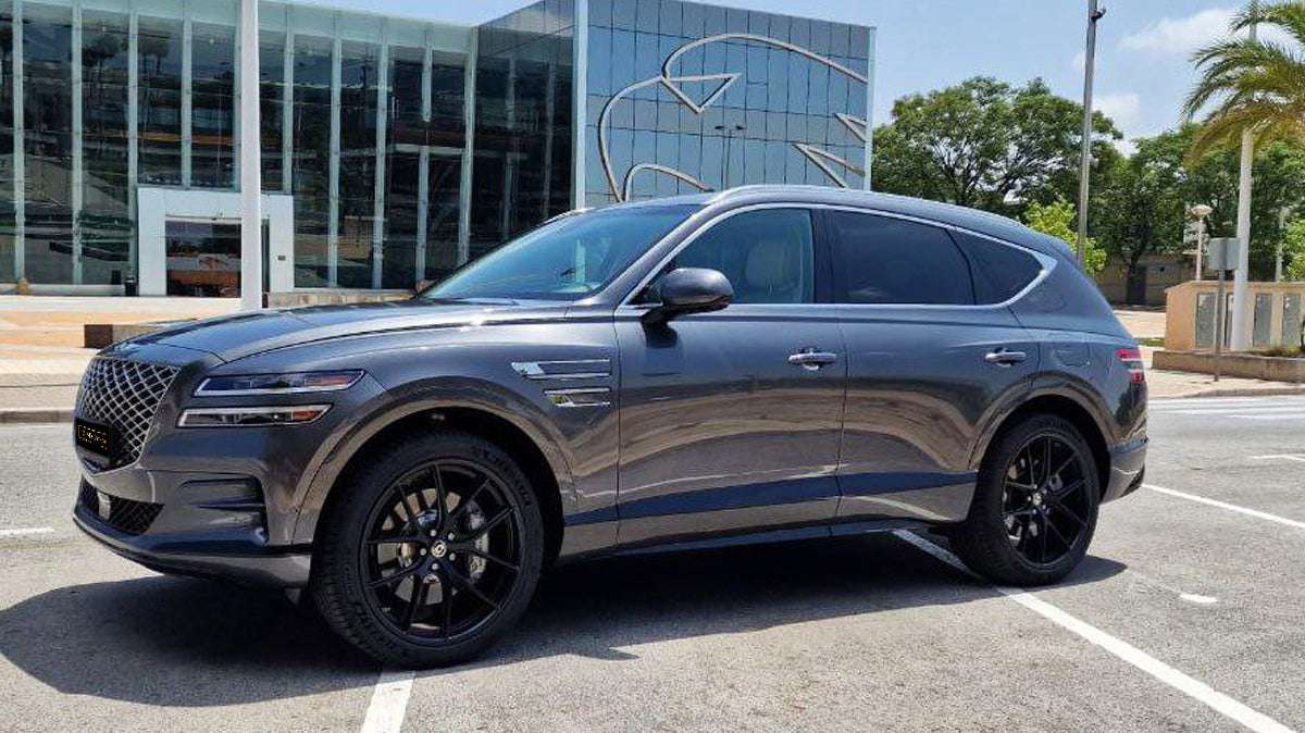 Genesis GV80 luxury SUV for rent in Alicante β mid-size premium crossover with modern technology and elegant design.