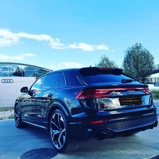 Black Audi RSQ8 SUV for rent in Marbella – 641 HP 4.0L V8 engine, automatic 4WD, luxury 5-seater.