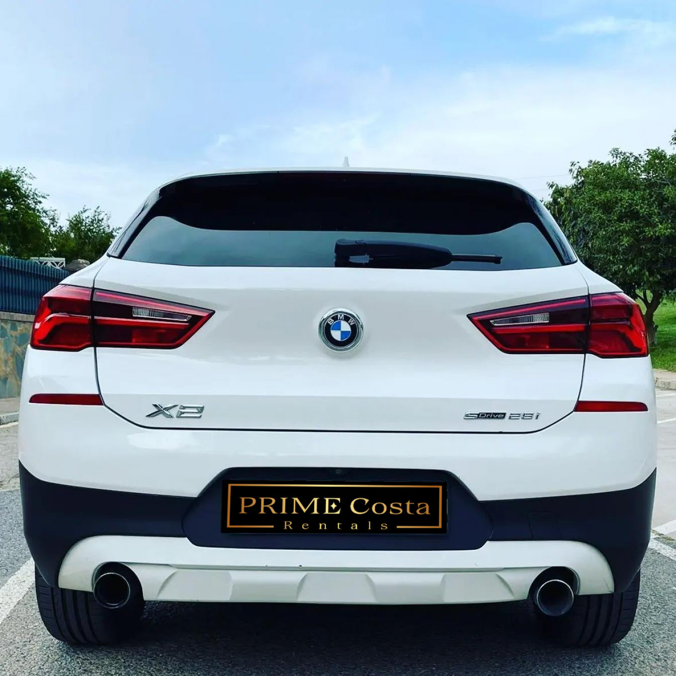 White BMW X2 SUV for rent in Marbella – automatic 4WD, 2.0L engine, compact 5-seater crossover.