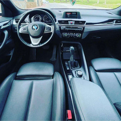 White BMW X2 SUV for rent in Marbella – automatic 4WD, 2.0L engine, compact 5-seater crossover.