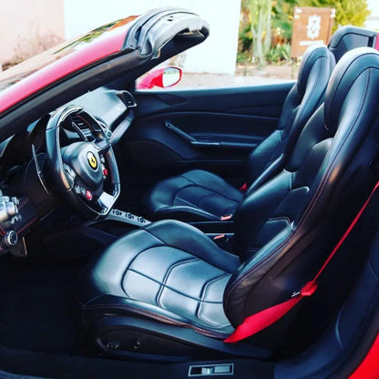 Red Ferrari 488 Spider for rent in Marbella – 720 HP, 3.9L V8 automatic supercar convertible with 2 seats.
