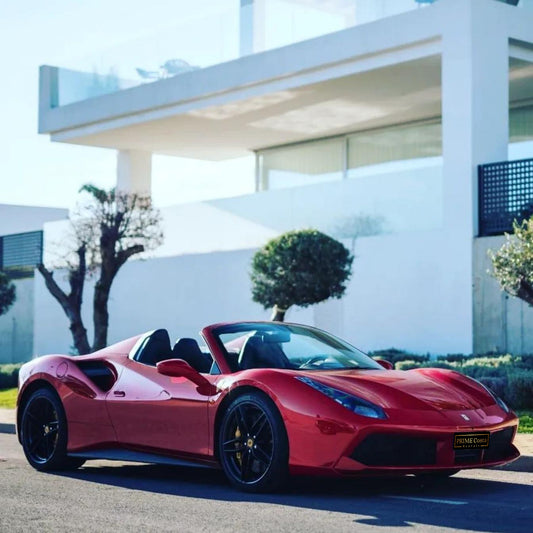 Red Ferrari 488 Spider for rent in Marbella – 720 HP, 3.9L V8 automatic supercar convertible with 2 seats.