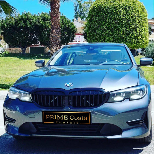 Silver BMW 320d sedan for rent in Marbella – automatic diesel with 190 HP and sleek modern design.
