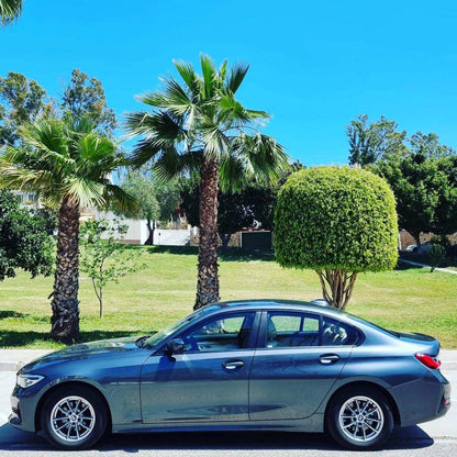Silver BMW 320d sedan for rent in Marbella – automatic diesel with 190 HP and sleek modern design.