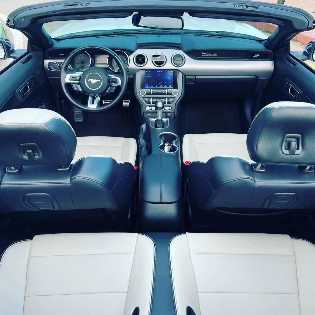 Ford Mustang Cabrio 2.3L turbo convertible for rent in Marbella – 350 HP, automatic, open-top driving.