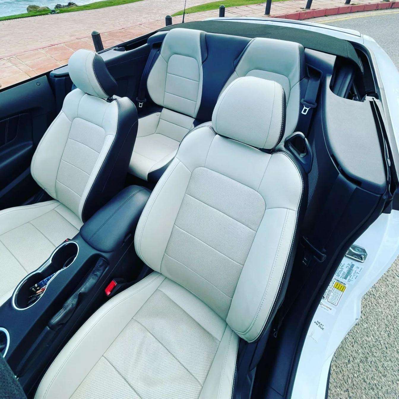 Ford Mustang Cabrio 2.3L turbo convertible for rent in Marbella – 350 HP, automatic, open-top driving.
