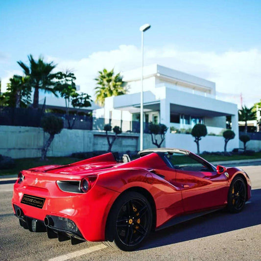 Red Ferrari 488 Spider for rent in Marbella – 720 HP, 3.9L V8 automatic supercar convertible with 2 seats.