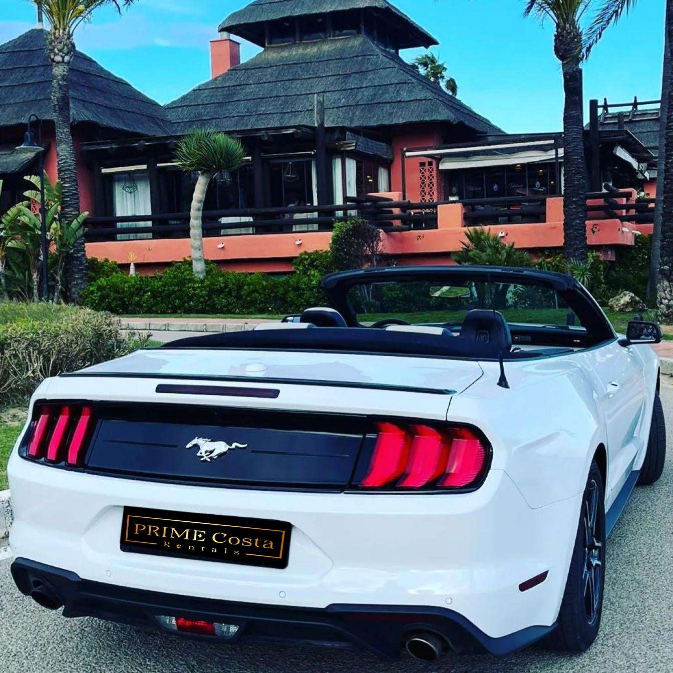 Ford Mustang Cabrio 2.3L turbo convertible for rent in Marbella – 350 HP, automatic, open-top driving.