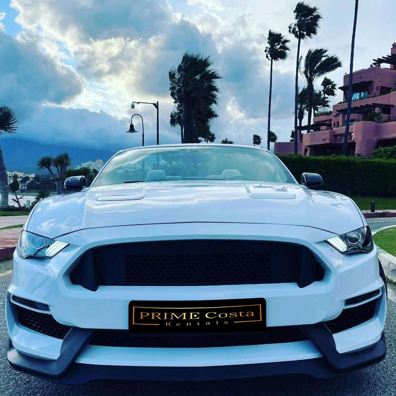Ford Mustang Cabrio 2.3L turbo convertible for rent in Marbella – 350 HP, automatic, open-top driving.