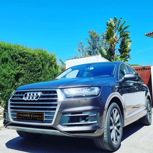 Silver Audi Q7 SUV for rent in Marbella – 3.0L engine, automatic 4WD, 5-seater luxury SUV.