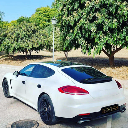 White Porsche Panamera 4 limousine for rent in Marbella – 3.6L engine, automatic 4WD luxury 4-seater.