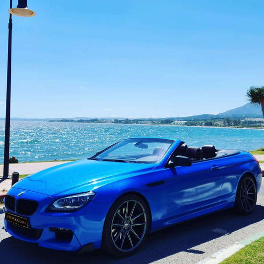 Blue BMW 640i Cabrio convertible for rent in Marbella – 3.0L automatic, 4 seats, luxury open-top driving.