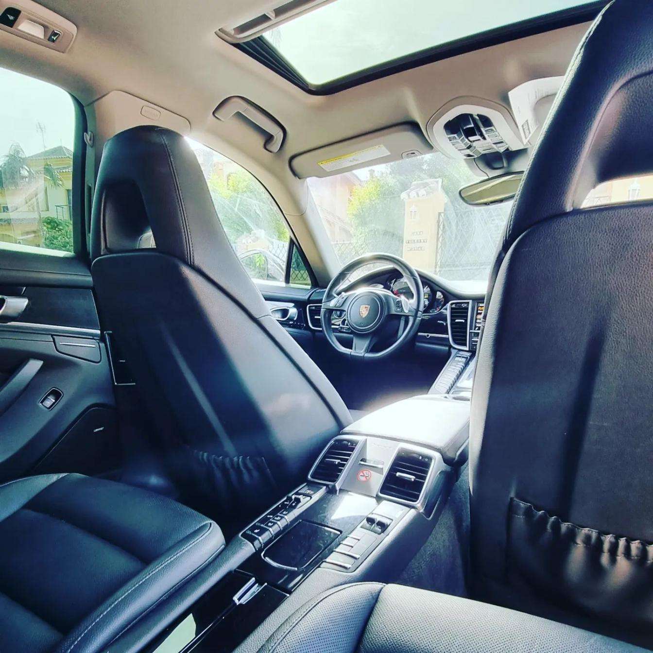 White Porsche Panamera 4 limousine for rent in Marbella – 3.6L engine, automatic 4WD luxury 4-seater.