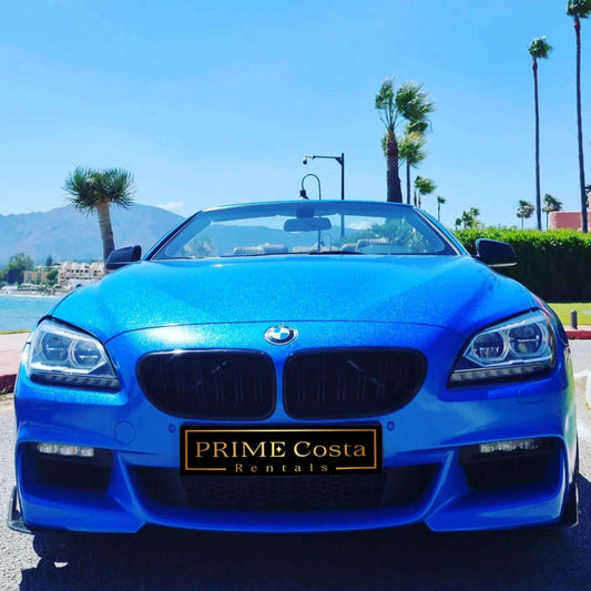 Blue BMW 640i Cabrio convertible for rent in Marbella – 3.0L automatic, 4 seats, luxury open-top driving.