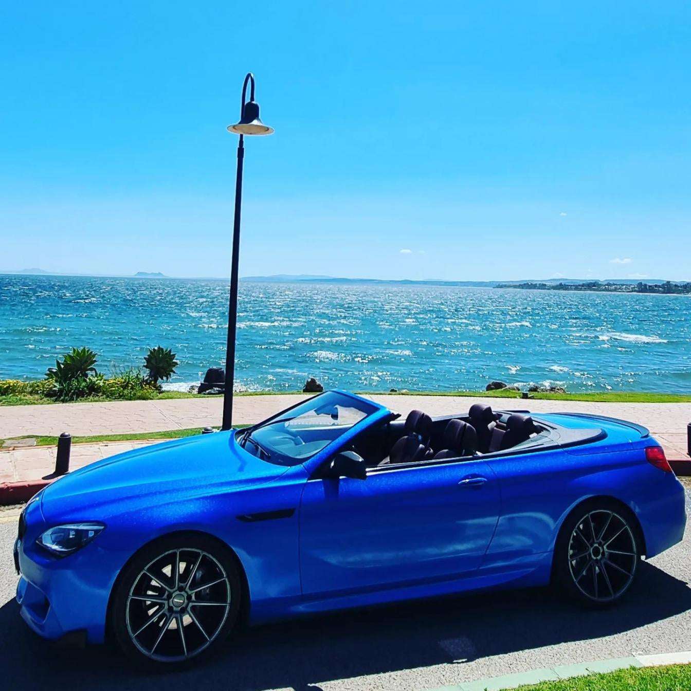 Blue BMW 640i Cabrio convertible for rent in Marbella – 3.0L automatic, 4 seats, luxury open-top driving.