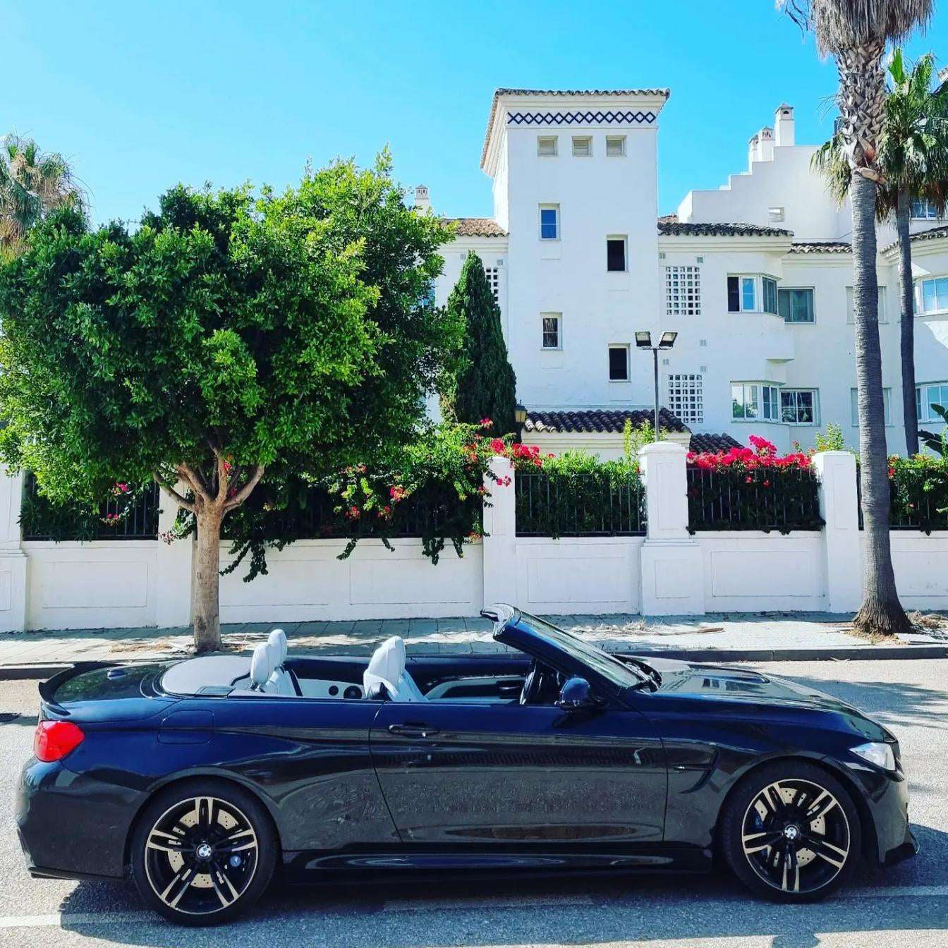Black BMW M4 Cabrio for rent in Marbella – 425 HP convertible with 3.8s 0–100 km/h and top speed of 300 km/h.