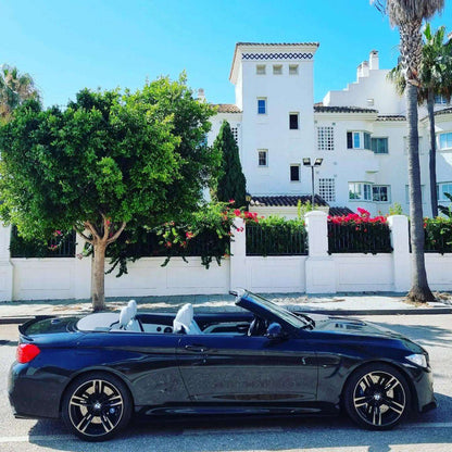 Black BMW M4 Cabrio for rent in Marbella – 425 HP convertible with 3.8s 0–100 km/h and top speed of 300 km/h.
