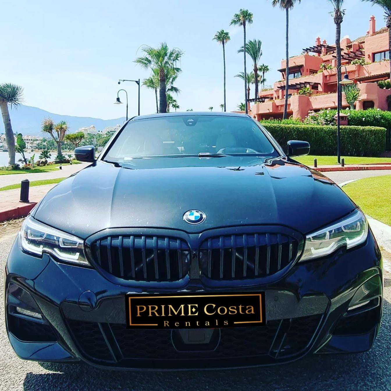 Black BMW 330i M Limousine for rent in Marbella – 2.0L automatic, 5-seater luxury sedan with 255 HP.
