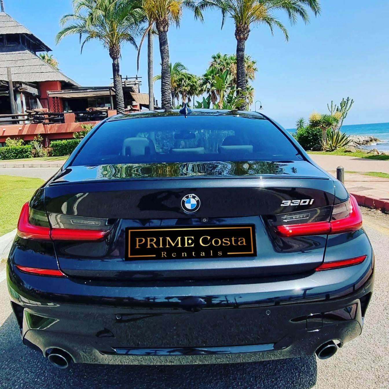 Black BMW 330i M Limousine for rent in Marbella – 2.0L automatic, 5-seater luxury sedan with 255 HP.
