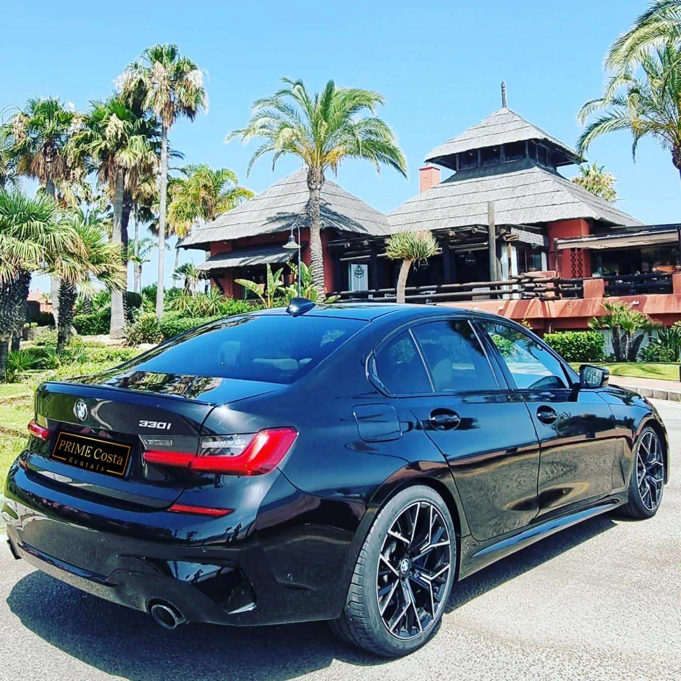 Black BMW 330i M Limousine for rent in Marbella – 2.0L automatic, 5-seater luxury sedan with 255 HP.
