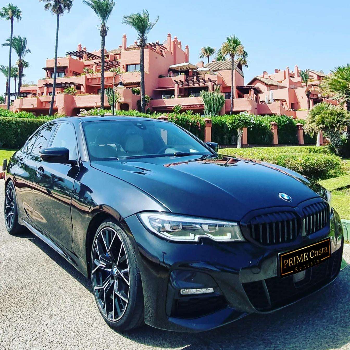 Black BMW 330i M Limousine for rent in Marbella – 2.0L automatic, 5-seater luxury sedan with 255 HP.
