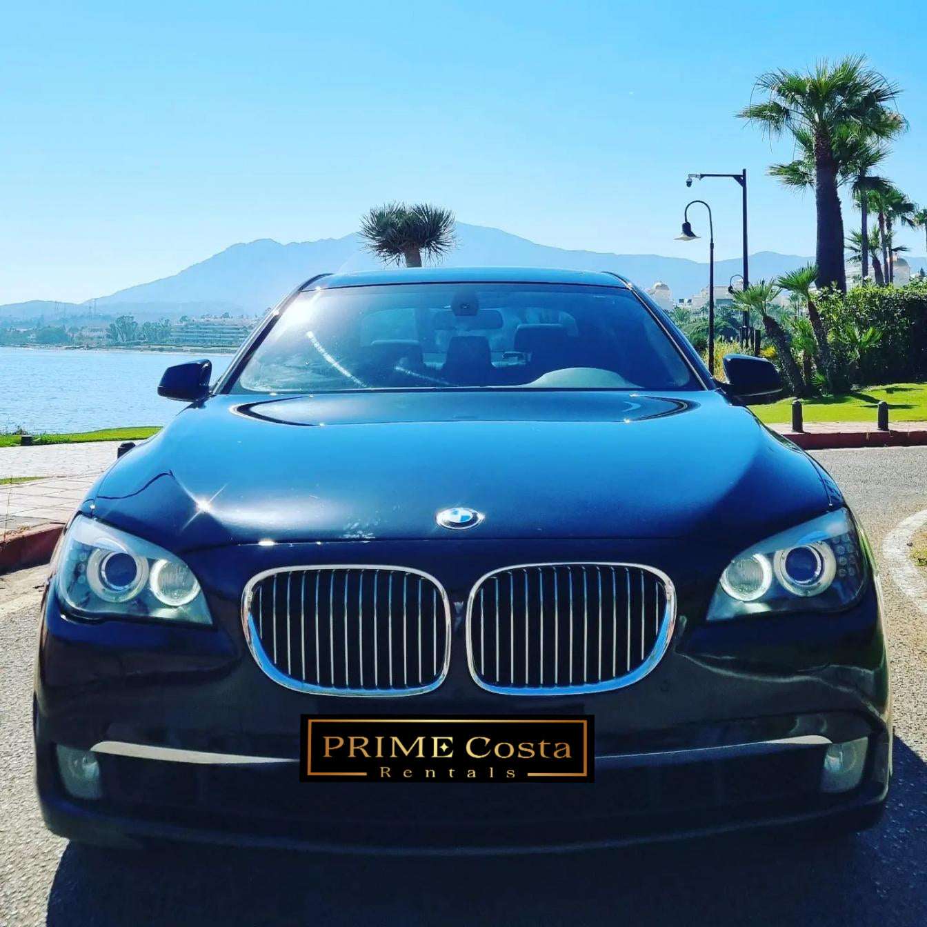 Black BMW 740Li limousine sedan for rent in Marbella – 3.0L automatic luxury car with seating for 5.