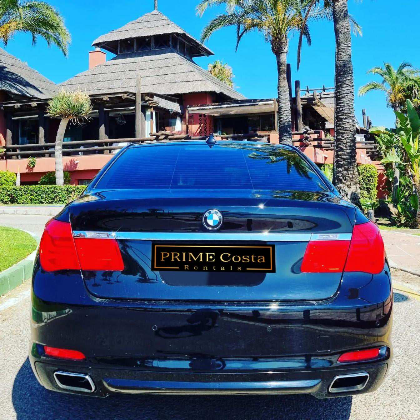 Black BMW 740Li limousine sedan for rent in Marbella – 3.0L automatic luxury car with seating for 5.