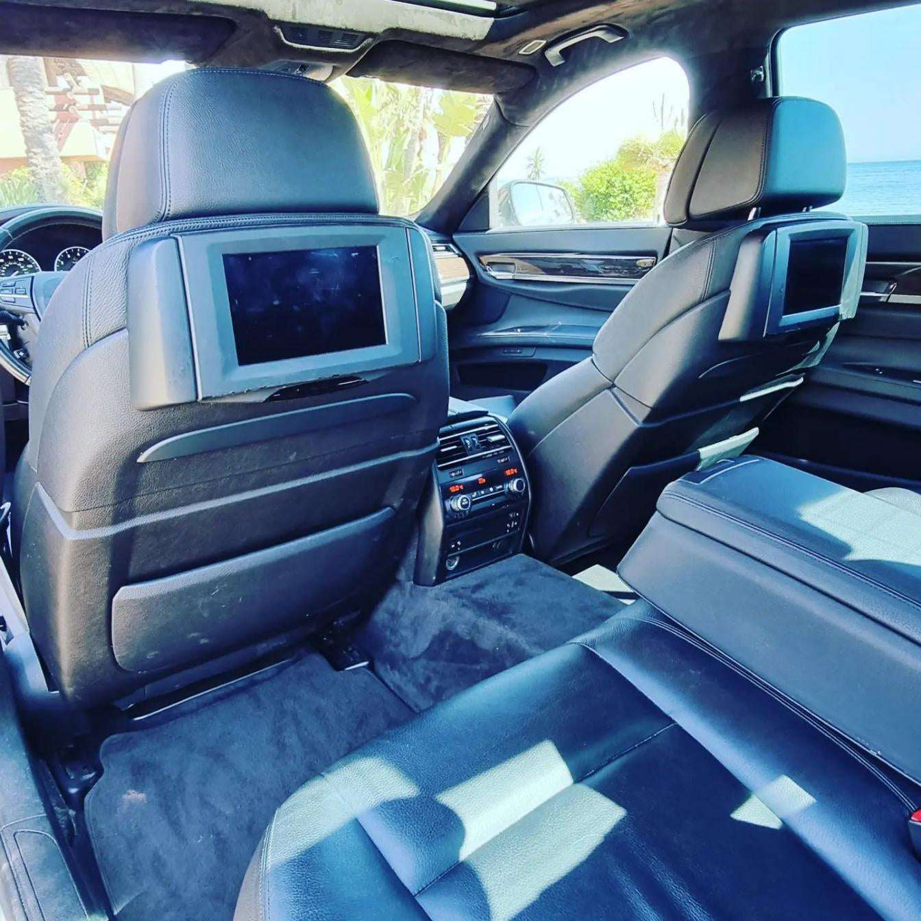 Black BMW 740Li limousine sedan for rent in Marbella – 3.0L automatic luxury car with seating for 5.