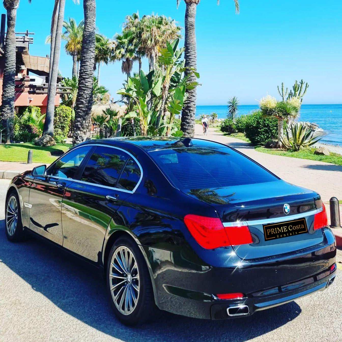 Black BMW 740Li limousine sedan for rent in Marbella – 3.0L automatic luxury car with seating for 5.