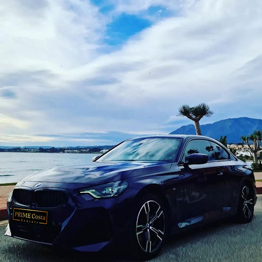 Purple BMW 220i M Coupe for rent in Marbella – brand new 2.0L automatic with sporty design and seating for 4.